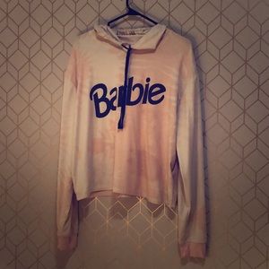 A shirt quoted “Barbie”